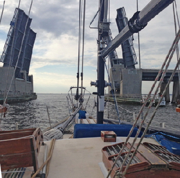 A bascule bridge opens on request.