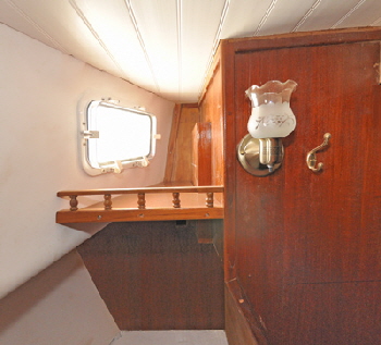 This corner shelf is just a way to give a little extra storage for books etc.