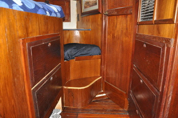  A seat was built-in on each side of the bed, that also acted as a step up to get into the bed.