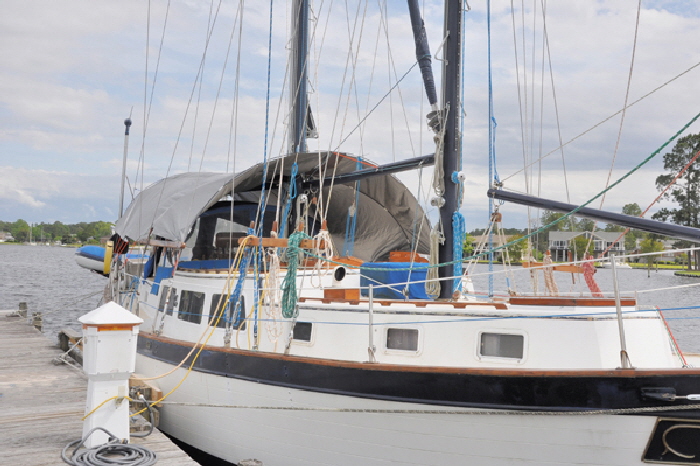The finished awning covers the whole of the cockpit and forward of the mast.
