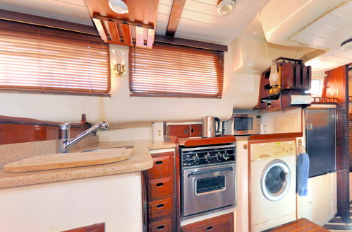 The new galley now has a  freezer, washer/dryer, refrigerator, and convection microwave. There is also a pantry.