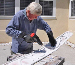 Bending the board to the approximate shape with a heat gun. 