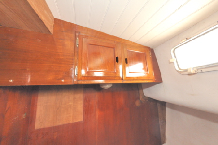 New overhead lockers offer excellent storage for extra pillows or bedding.