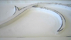 After routing the relief is left proud. 