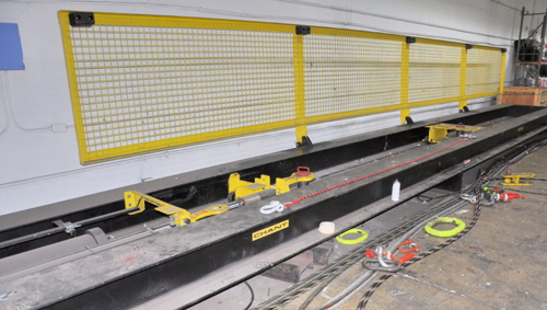 A powerful machine to test the strength of ropes and splices.