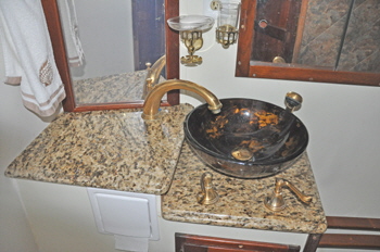 the vessel-bowl sits on marbal slabs.