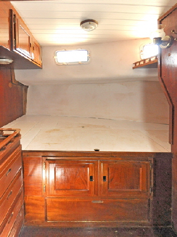 Removal of the side cupboards added 9" inches to the width of the bed.