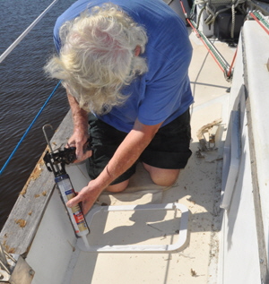 With the new port installed the outer rim is glued in place.