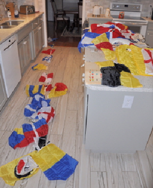 Sorting out the flags, to dress ship.