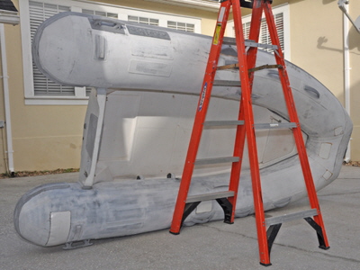 Ladder supporting the dinghy.