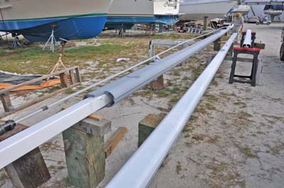 Masts being worked on tresles.