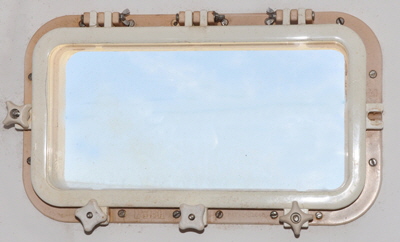 This is the old style portlight whith the broken toggle latch. They are easy to break if they are overtightened.