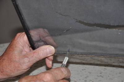 Cutting the old mesh out of the framework.