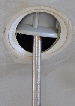Screwdriver holding the valve in place.