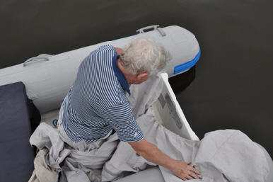 Sorting out the cover before fitting it to the rear pods.