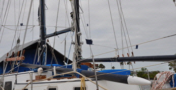 This rotating device can be suspended from ropes  between masts.