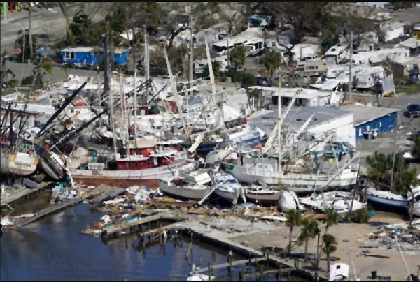 Wrecked boats and RV;s after a hurricane hits Florid.