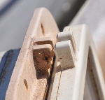 The broken base of this frame could not be repaired.